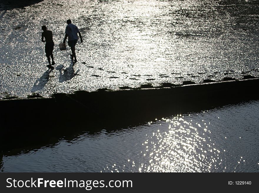 It is ebb in the harbour of Port-en-Bessin. Fishermen have left their footsteps. It is ebb in the harbour of Port-en-Bessin. Fishermen have left their footsteps.