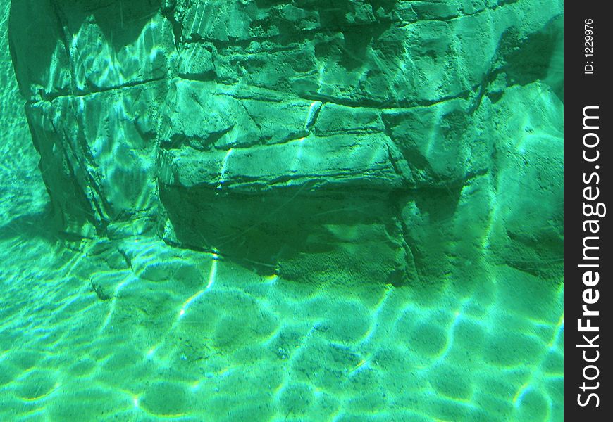 View of rocks from under the water. View of rocks from under the water