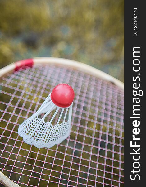 Badminton is a sport game. In the form of a racket and shuttlecock. Badminton is a sport game. In the form of a racket and shuttlecock.