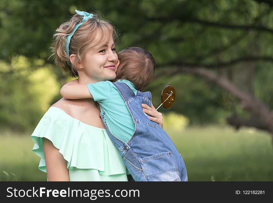 Mom and son in the park in the summer