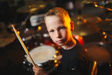 Boy Plays Drums In Recording Studio Royalty Free Stock Images
