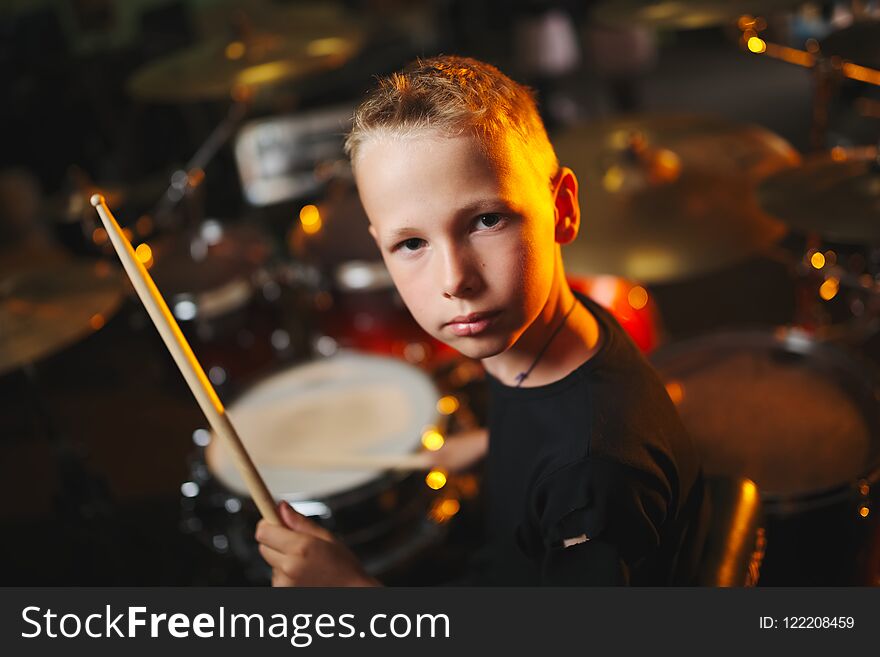 Boy Plays Drums In Recording Studio