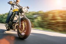 Motorbike On The Road Riding. Having Fun Riding The Empty Road O Stock Photography