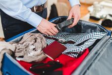 Man Packing His Clothes And Stuff Stock Photography