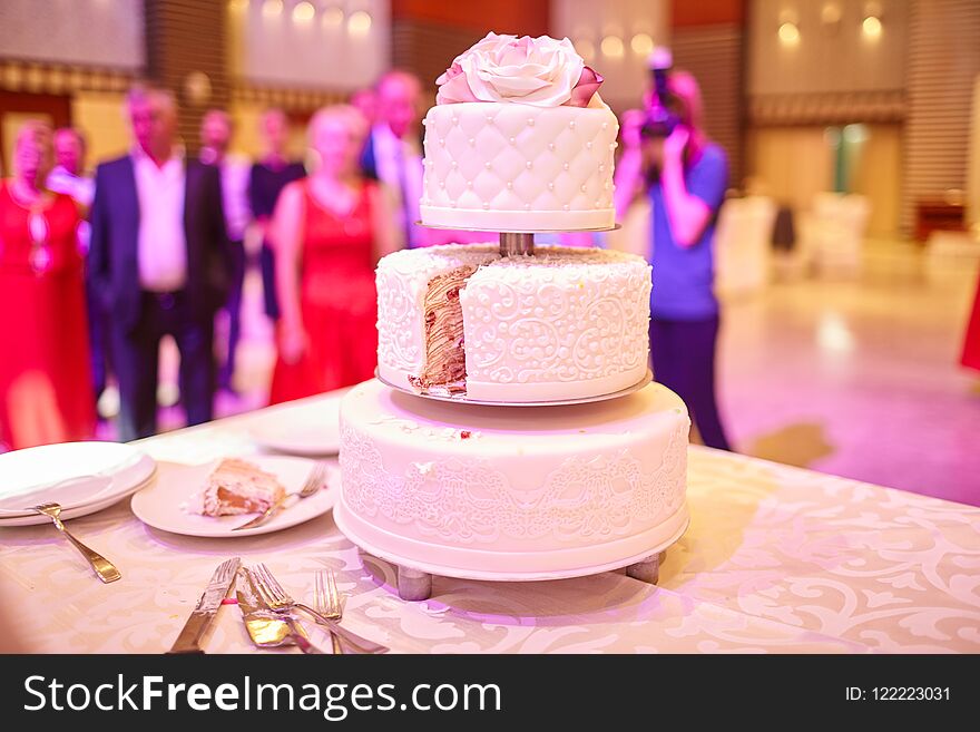 Beautiful white wedding cake on the table