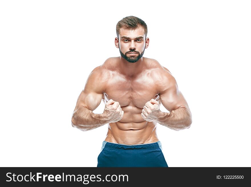 Bodybuilder posing. Beautiful sporty guy male power. Fitness muscled in blue shorts. on isolated white background. Man
