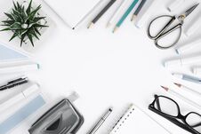 White Tabletop With Office Supplies And Copy Space In Center Royalty Free Stock Photography White Tabletop With Office Supplies And Copy Space In Center Royalty Free Stock Photography