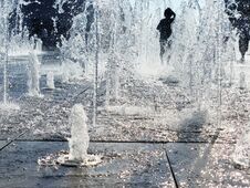 Dry Fountain And Kid On A Hot Day Stock Image
