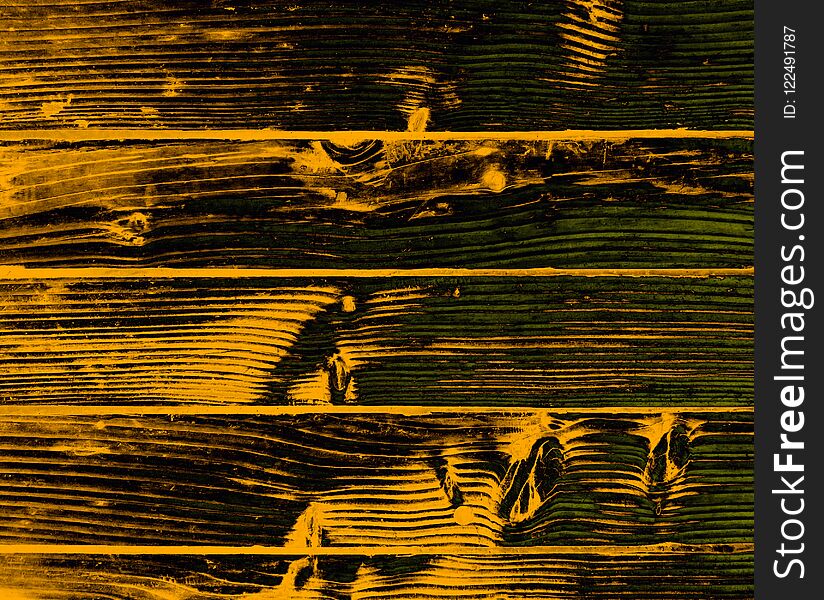 Abstract background. Wooden structure of pine planks in yellow burnt color.