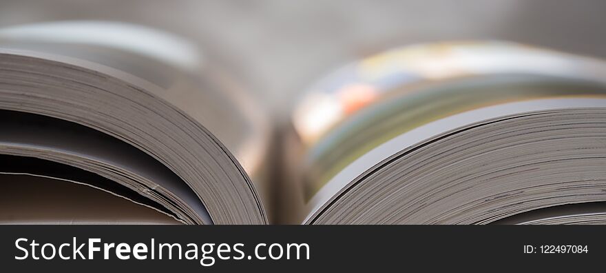 Pages of an open book, light tonality. Web banner.