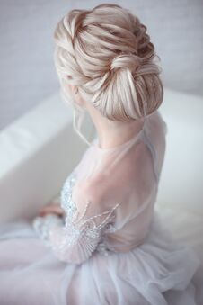 Beauty Wedding Hairstyle. Bride. Blond Girl With Curly Hair Styling. Back View Of Elegant Lady In Bridal Dress. Stock Images