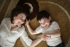 Free Beautiful Brunette Mom Playi And Hugging With Son Stock Image - 122788011