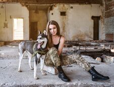 Beautiful Military Girl With Husky Stock Photos