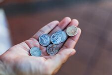 View Of The Singapore Dollar , The View Of Silver Coins In Singapore At Hand. Stock Photography