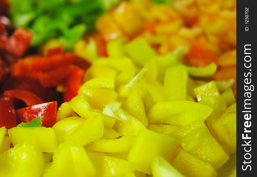 Four colors slice of paprika. Yellow slices in front of view. Four colors slice of paprika. Yellow slices in front of view