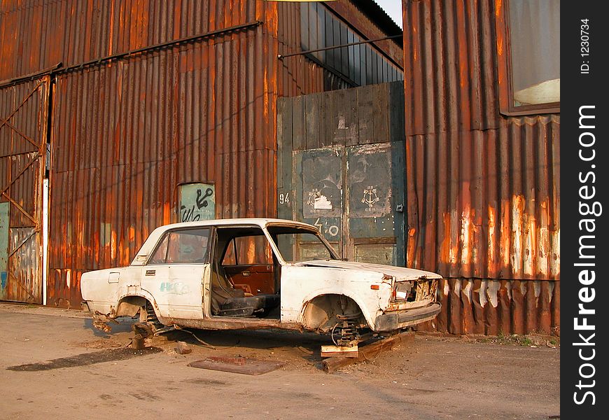 This old car, rusted through, waits for someone to pick it up. This old car, rusted through, waits for someone to pick it up...
