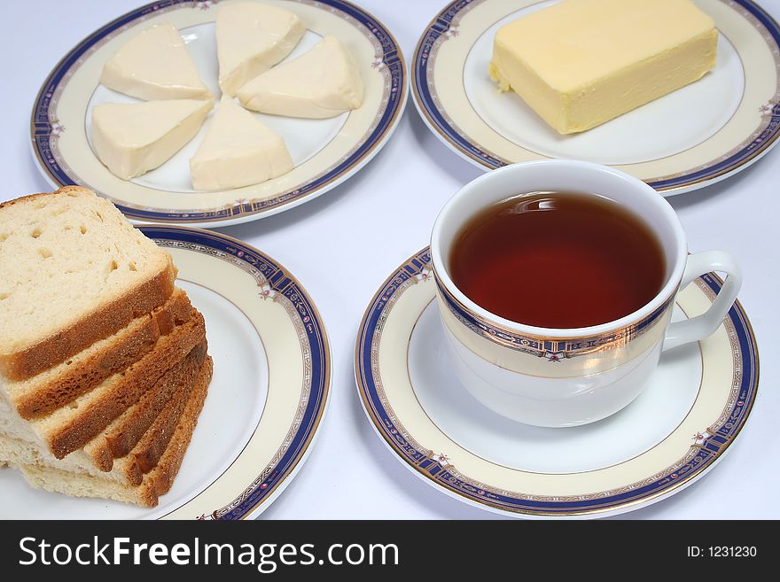 Breakfast with tea,cheese,bread and butter