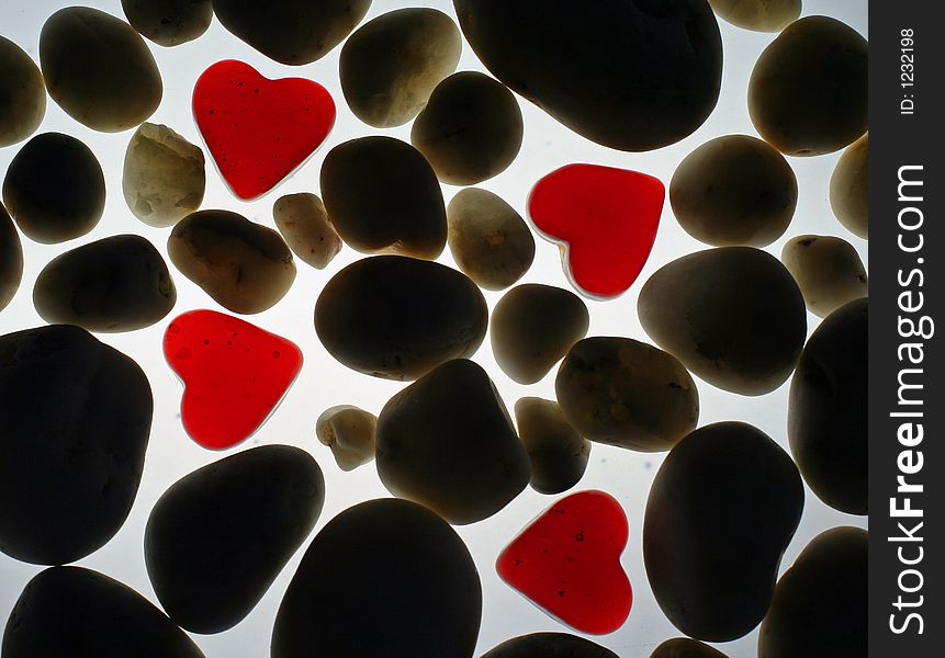 Red hearts with sea stones. Red hearts with sea stones