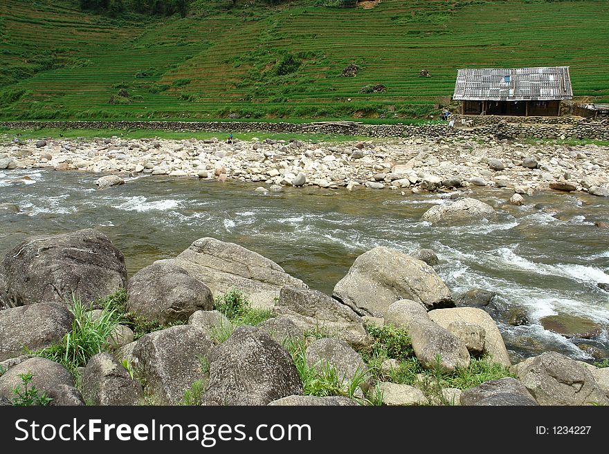A shed on a hill with a river in front in Sapa, Vietnam. A shed on a hill with a river in front in Sapa, Vietnam