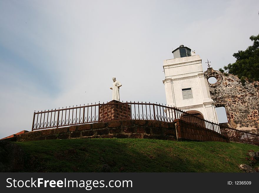 St Paul Ruins in Malacca, Malaysia, with St Francis Xavier statue in the front. St Paul Ruins in Malacca, Malaysia, with St Francis Xavier statue in the front