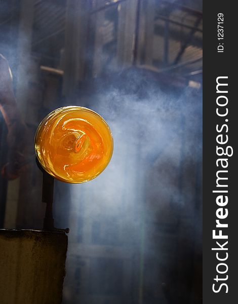Hot orange melting glasses on factory. Hot orange melting glasses on factory