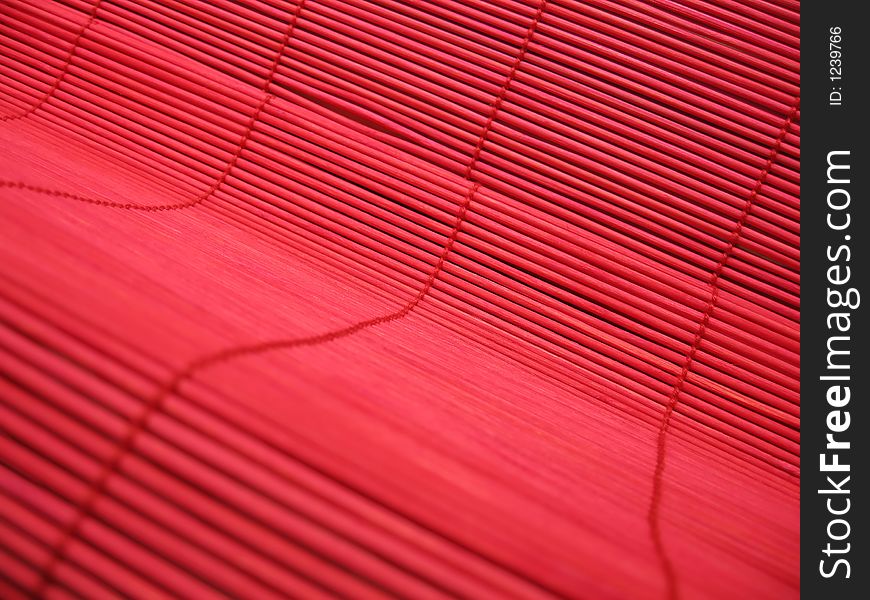 Vivid red bamboo textured background.