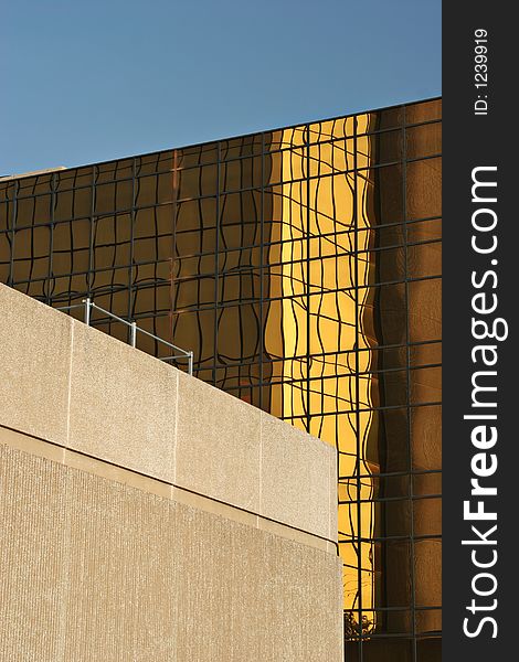 Office building in Texas with golden glass elevation