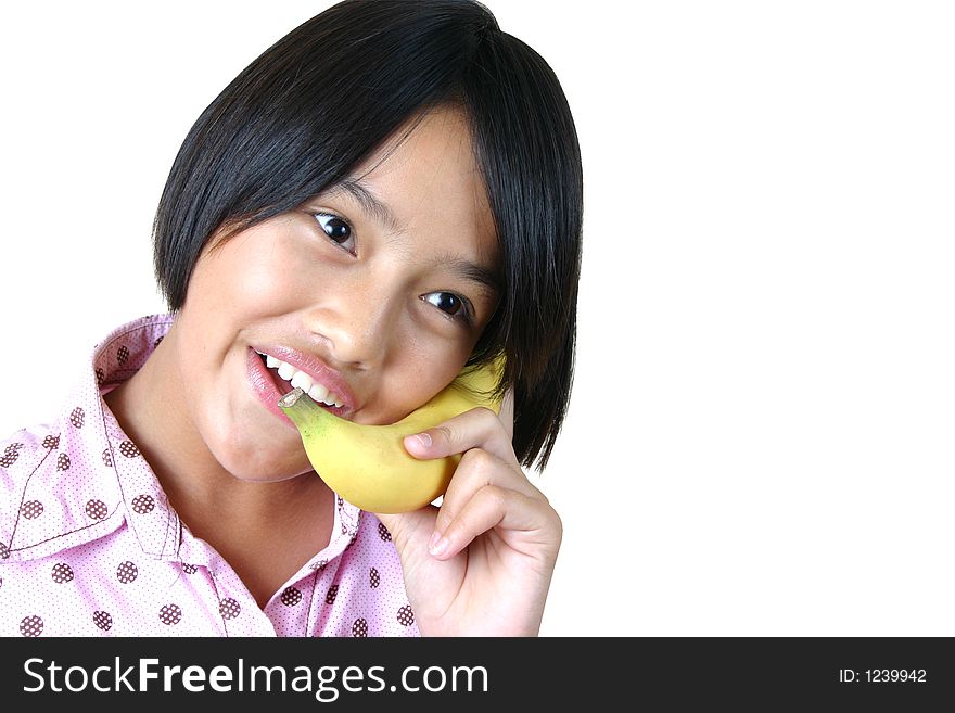 Pretty girl holding banana as a phone. Pretty girl holding banana as a phone.