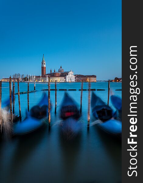 San Giorgio Maggiore church and gondolas at twilight in Venice