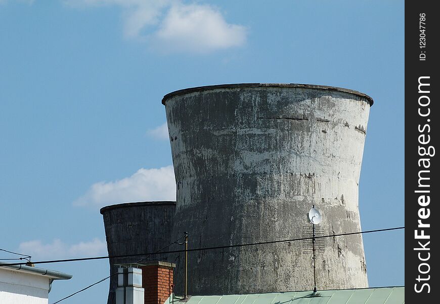 Old concrete stacks or chimneis under blue sky. Abstract. Old concrete stacks or chimneis under blue sky. Abstract.