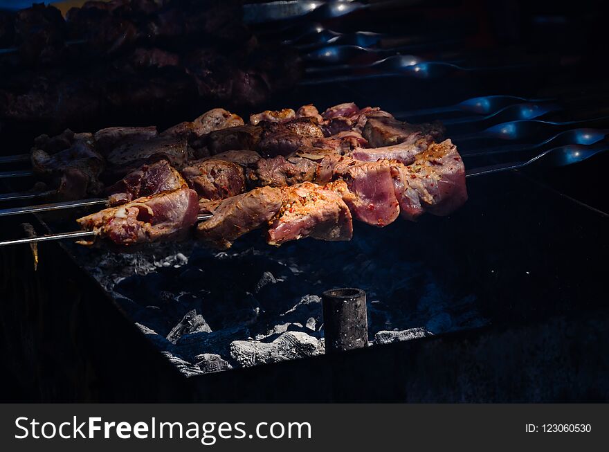 Shish kebab with spices preparing on skewers. Shish kebab with spices preparing on skewers