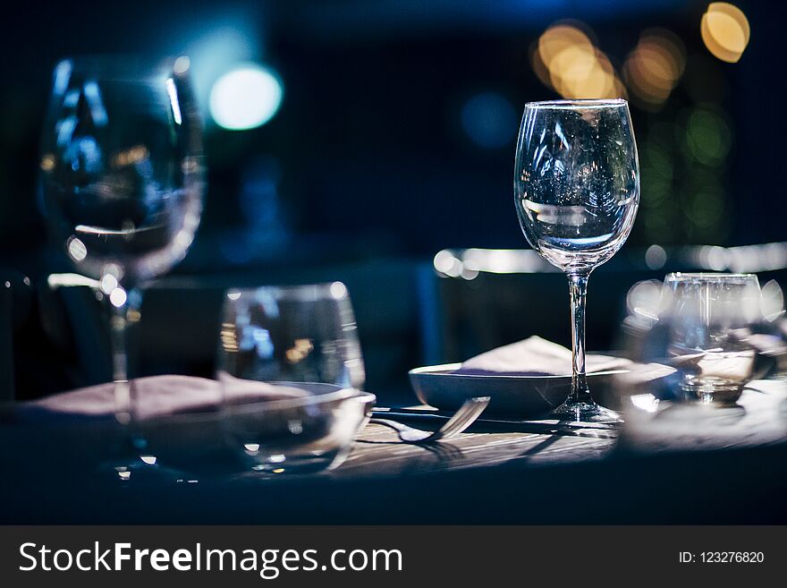 Luxury Table Settings For Fine Dining With And Glassware, Beautiful Blurred Background. For Events, Weddings.