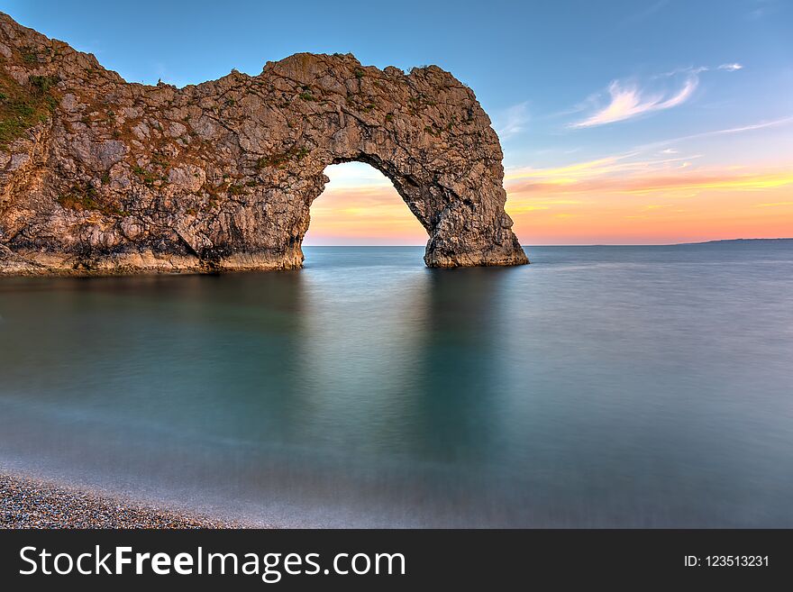 The Durdle Door, part of the Jurassic Coast in southern England, after sunset