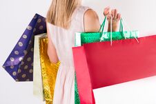 Fashion Model Girl With Shopping Colorful Bags In Hands And Cream Lace Dress Stock Images Fashion Model Girl With Shopping Colorful Bags In Hands And Cream Lace Dress Stock Images