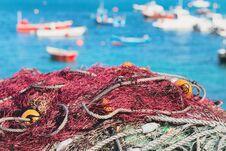 Fishing Nets Against The Background Of Fishing Boats In The Gulf Stock Images