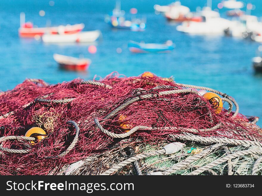 Fishing nets against the background of fishing boats in the gulf