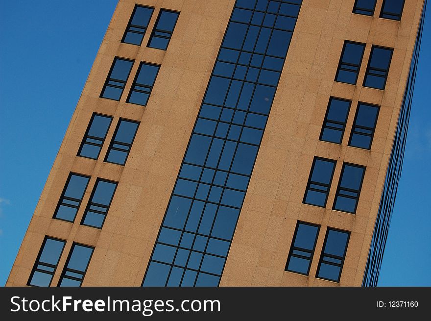 Office building with a blue sky background