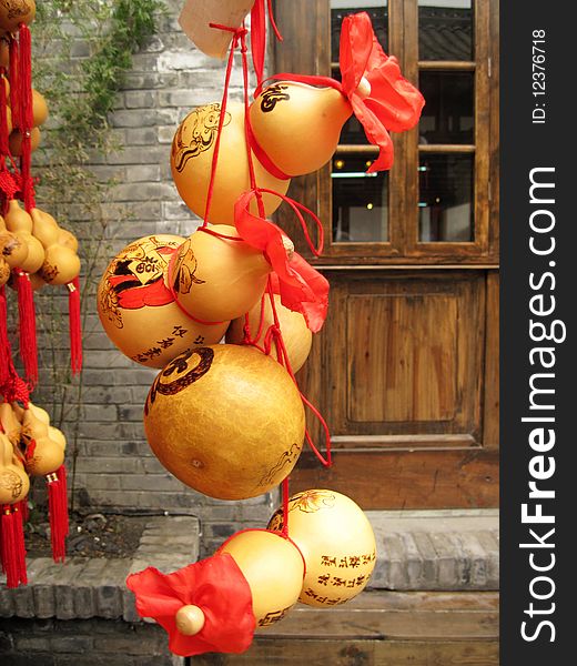 Painted calabash at the street with many words or verse on it