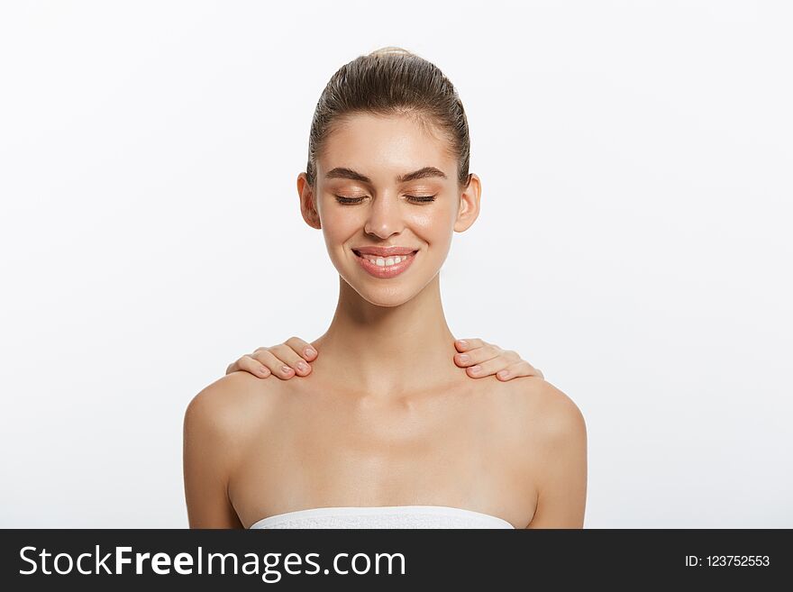 Beautiful Young Woman Relaxing With Hand Massage. Isolated On White Background.