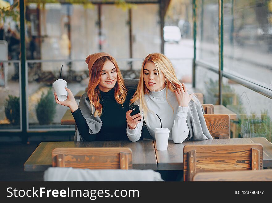 Two girls in cafe