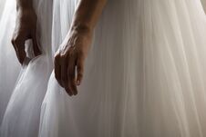 A Bride In A Beautiful Wedding Dress Holding Dress Hem Stock Image