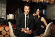 Beautiful Young Couple. Young Guy In A Suit, Girl In Elegant Royalty Free Stock Photo