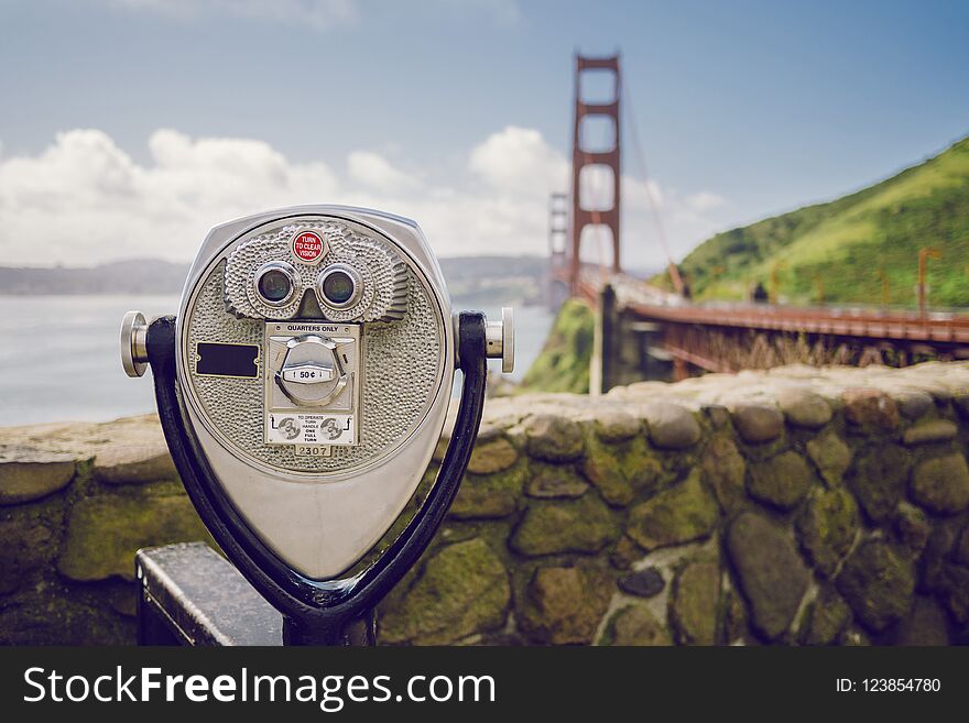 View of Golden Gate Bridge from binocular viewer and observation point. View of Golden Gate Bridge from binocular viewer and observation point