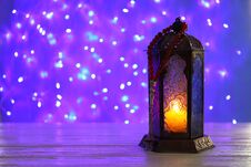 Muslim Lamp With Candle On Table Blurred Fairy Lights. Fanous As Ramadan Symbol Royalty Free Stock Photography