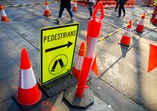 Pedestrian Signs Near Construction Site For Indicating People. Stock Images