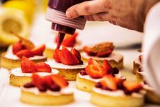 The Chef In The Kitchen Prepares Strawberry Desser Stock Photos The Chef In The Kitchen Prepares Strawberry Desser Stock Photos