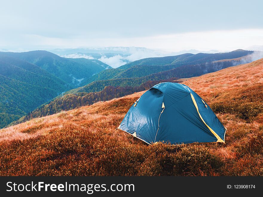 Tent on autumn mountains. Carpathians, Ukraine Europe