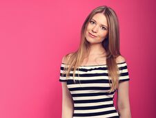 Beautiful Smiling Blond Long Stright Hairstyle Woman In Striped Stock Photo