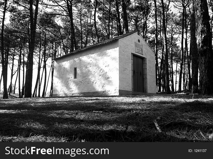 A little old chapel in the middle of the woods.