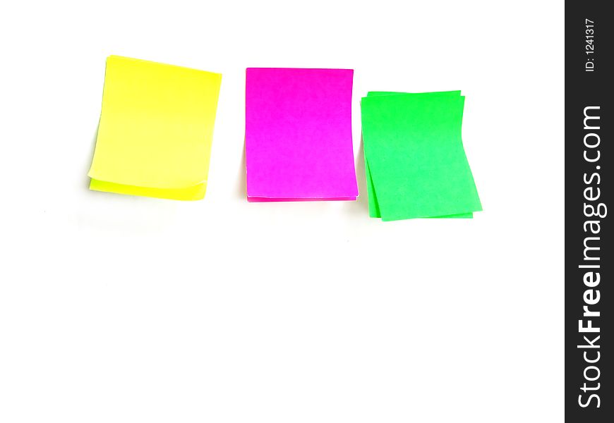 Several post it papers in differet colors. Several post it papers in differet colors